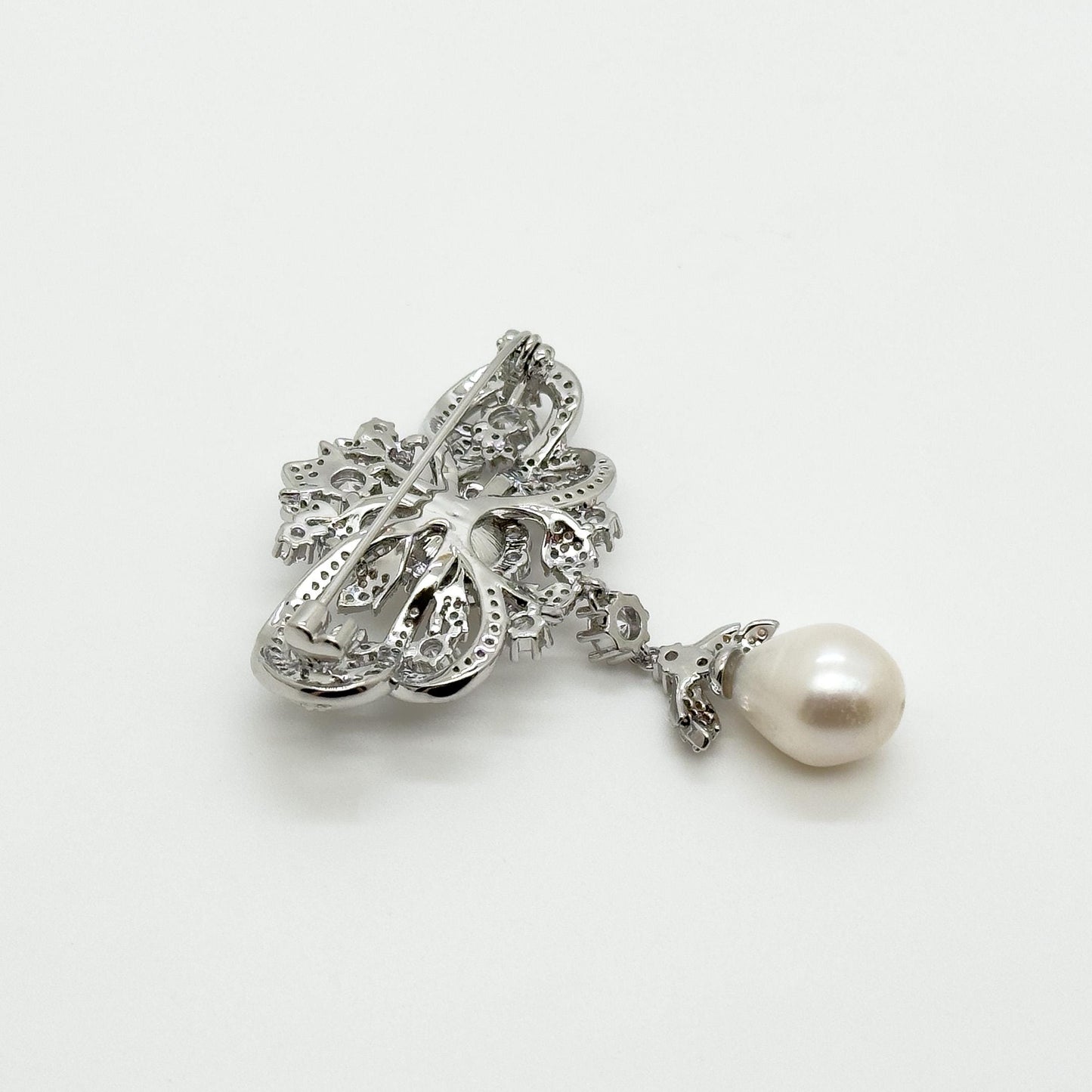 Vintage Rhinestone Bow Brooch with Dangling Pearl Pendant, Copper