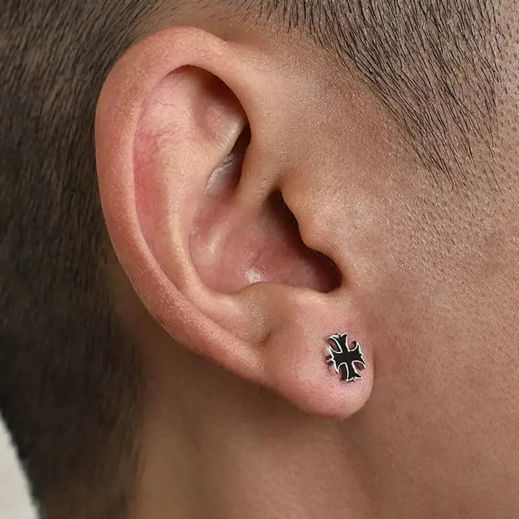 Iron cross stud earring in black and silver
