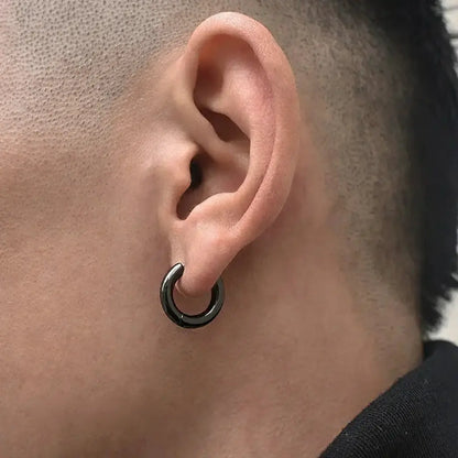 Black hoop earring with silver inner ring