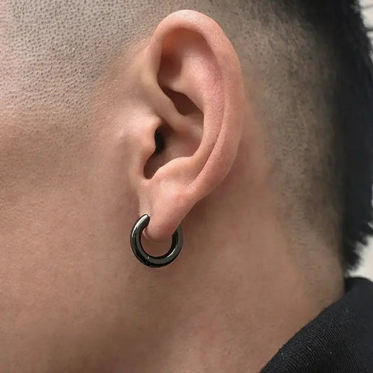 Black hoop earring with silver inner ring