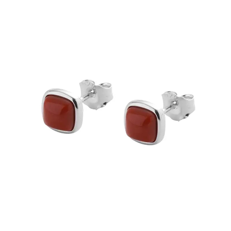 Red square stud earrings with silver accents and posts