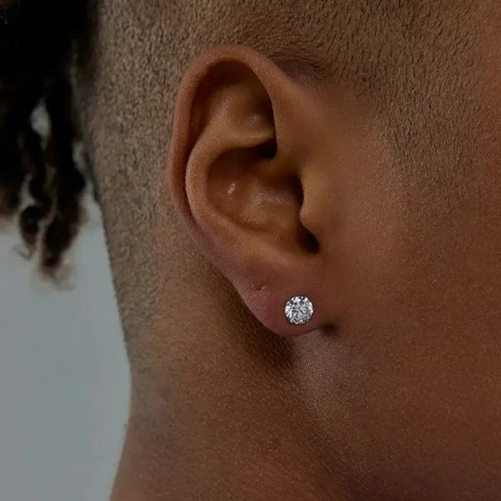 Diamond stud earrings with a white gold finish