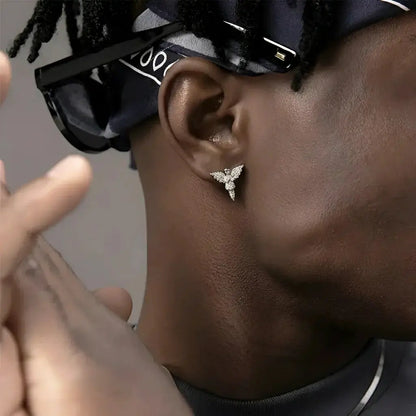 Gold butterfly stud earrings with intricate wing details