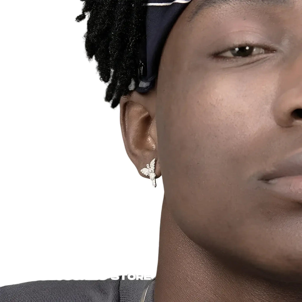 Silver butterfly stud earrings with intricate detailing