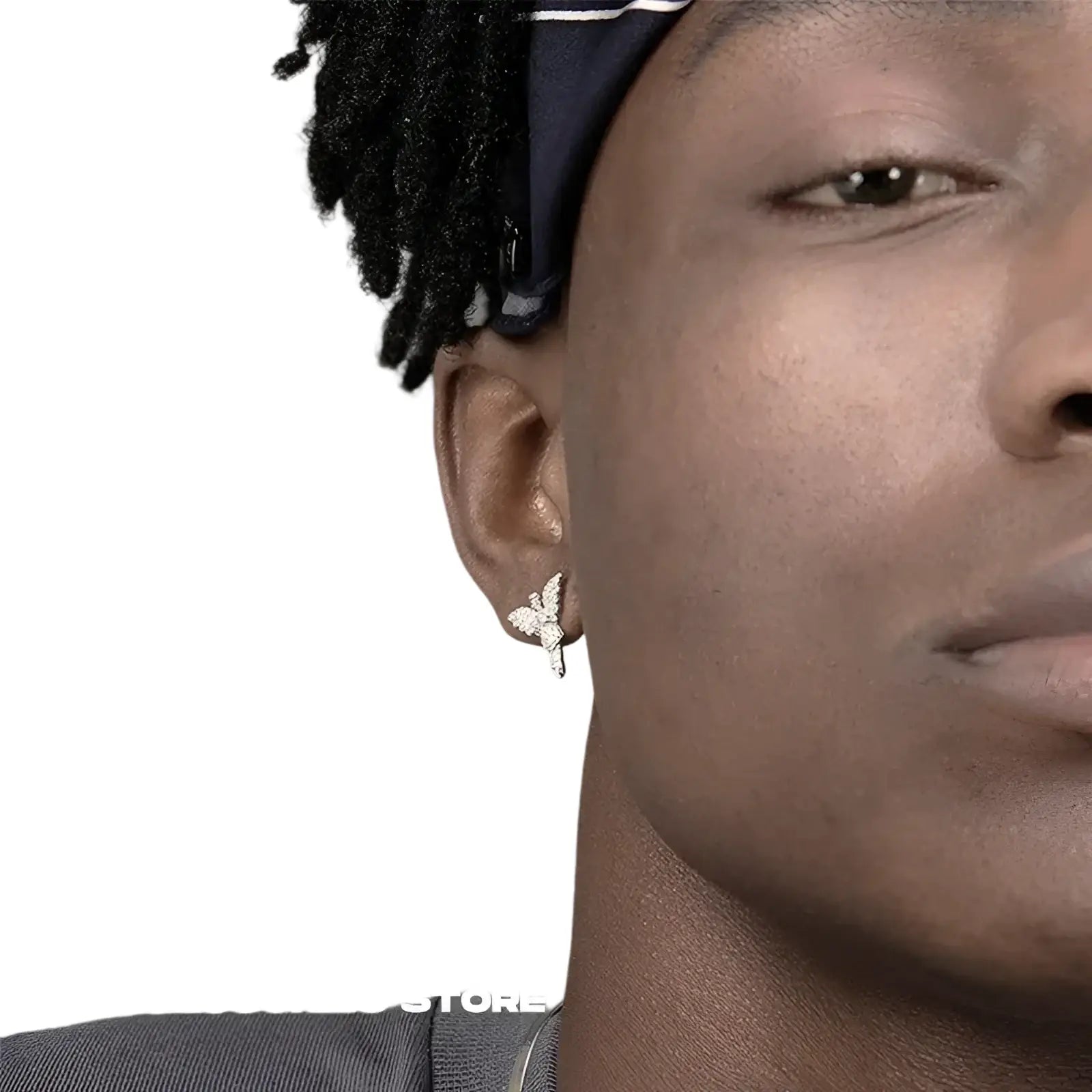 Silver butterfly stud earrings with intricate detailing