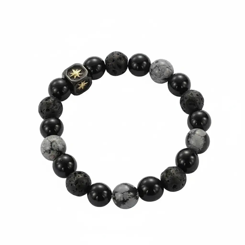 Black lava stone bracelet with gold star charm and white speckled beads