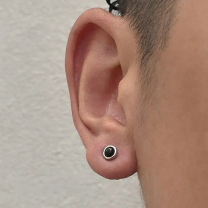 Black and silver stud earrings with a minimalist design