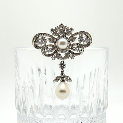 Vintage Rhinestone Bow Brooch with Dangling Pearl Pendant, Copper