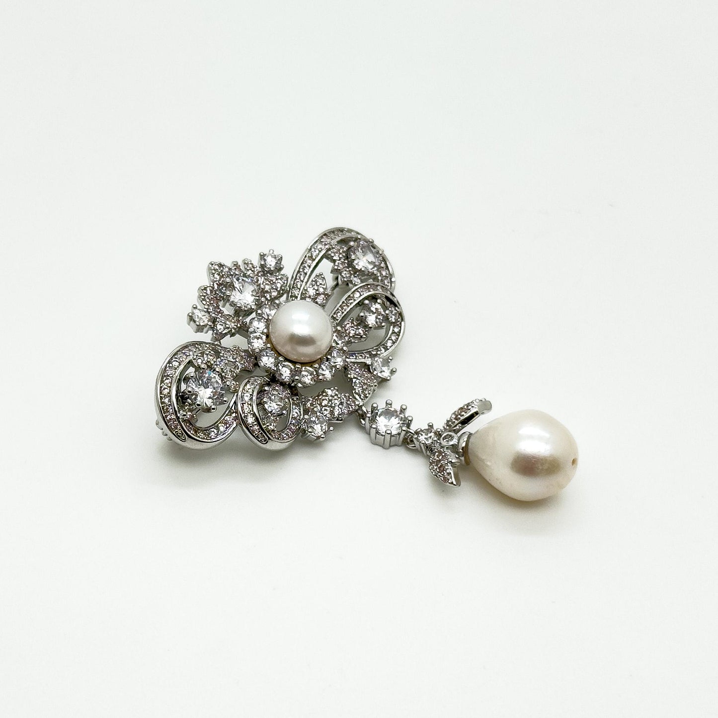 Vintage Rhinestone Bow Brooch with Dangling Pearl Pendant, Copper