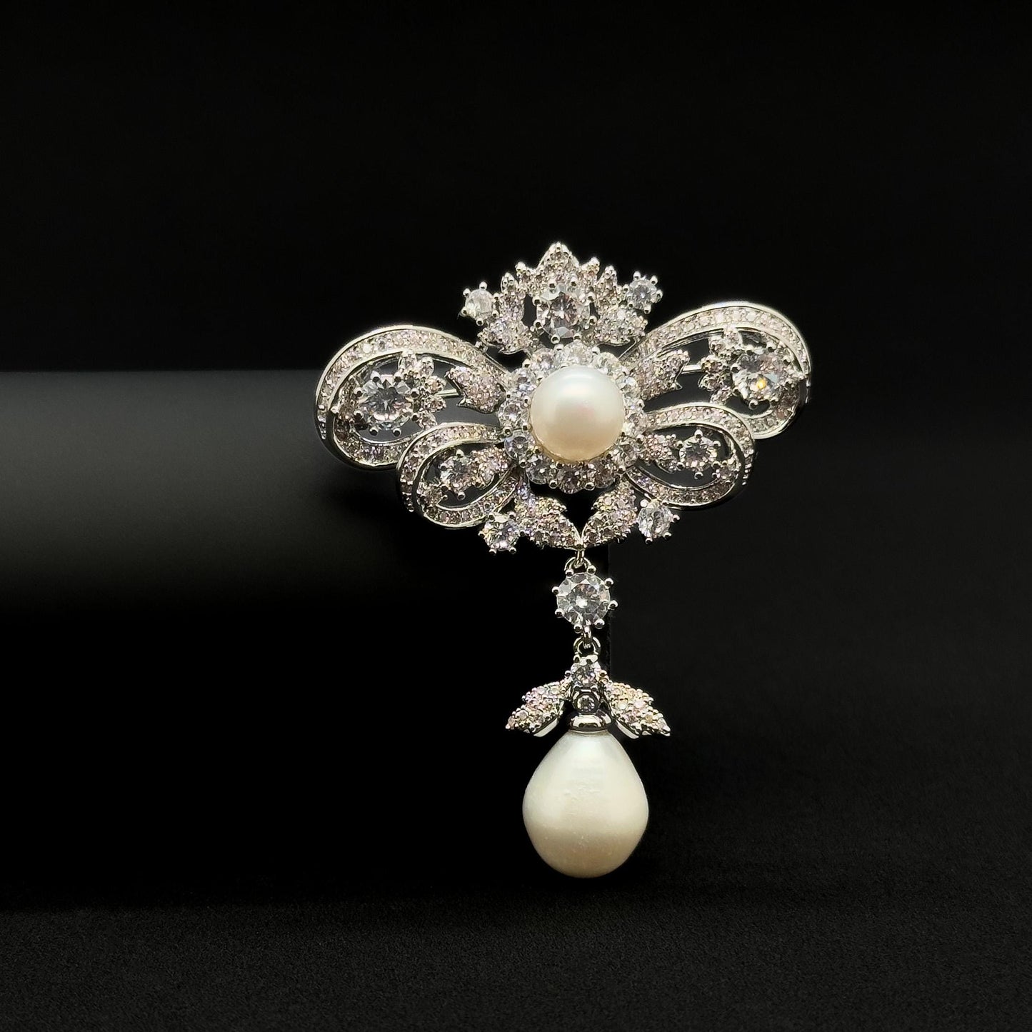 Vintage Rhinestone Bow Brooch with Dangling Pearl Pendant, Copper